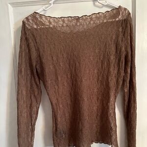 Sheer see through long sleeve shirt.